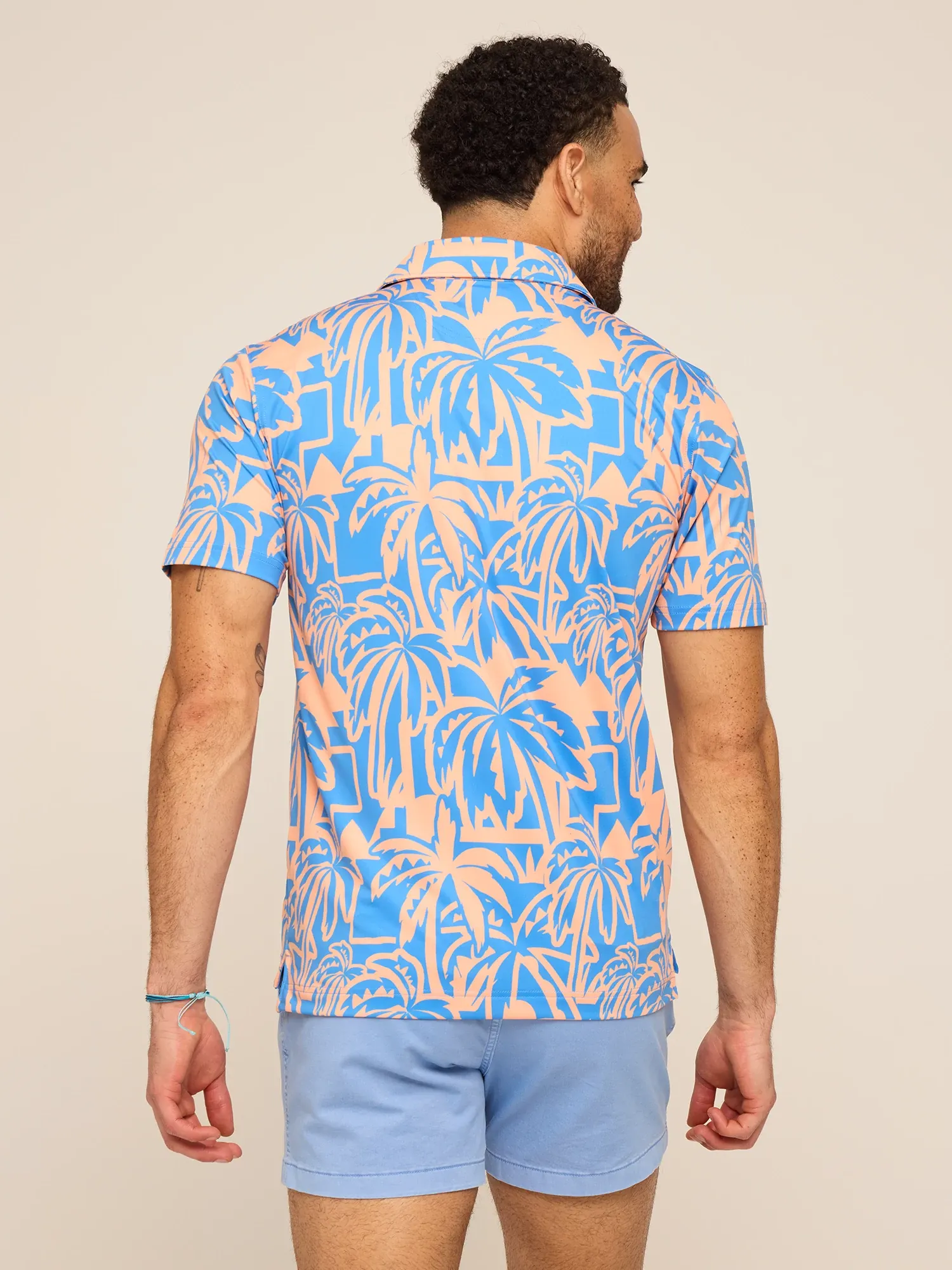 6161-the-frond-farewell-performance-polo-orange-2.webp The Frond Farewell (Performance Polo)- Orange