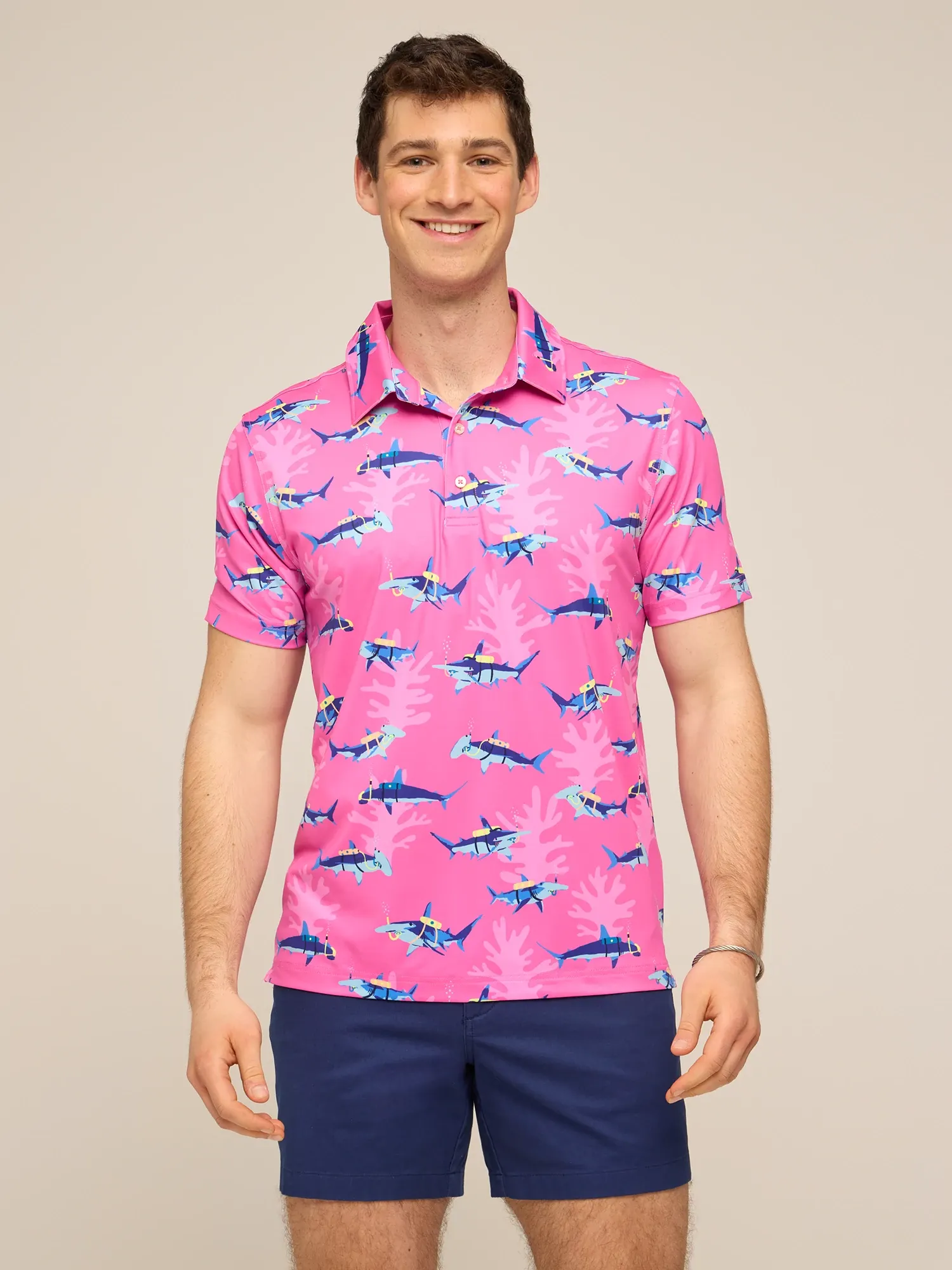 6235-the-great-pink-shark-performance-polo-1.webp The Great Pink Shark (Performance Polo)