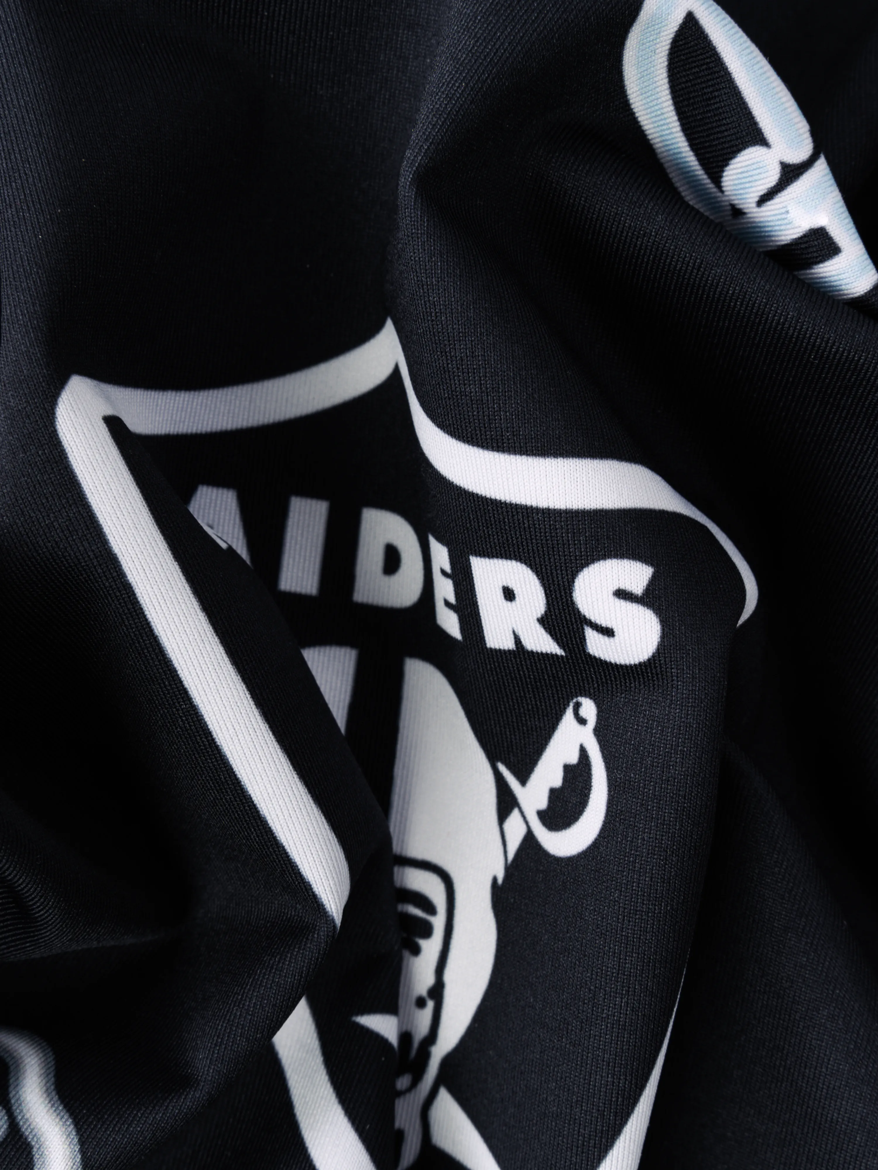 7068-the-neon-raiders-nfl-performance-polo-3.webp The Neon Raiders (NFL Performance Polo)
